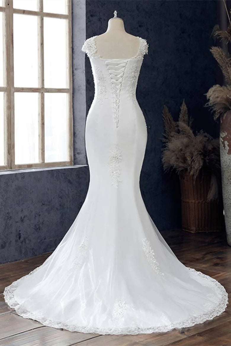 Robe de mariée trompette à manches courtes et dentelle perlée
